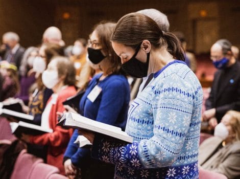 People standing in the Sanctuary during services