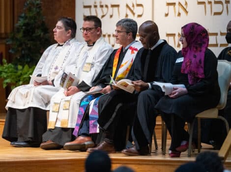 Clergy from different faiths on the bima