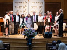 Group of people standing shoulder-to-shoulder on the bimah