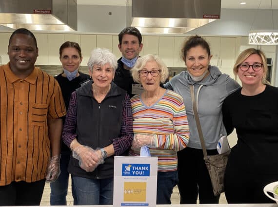 group of WHC members in a kitchen